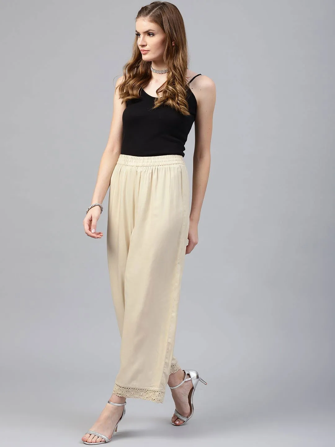 Jashvi Beige Solid Rayon Wide Leg Women Palazzo With One Pocket